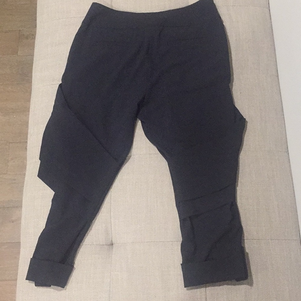 Alice and Olivia black Capris, with ruffle front